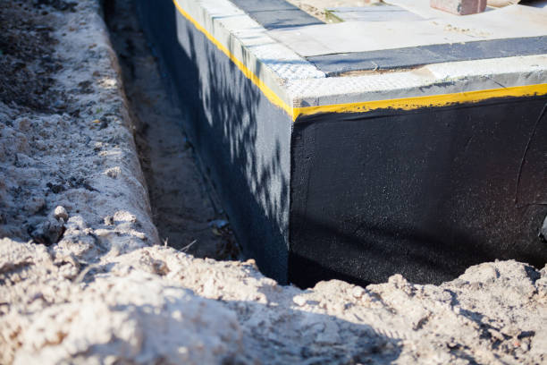Professional Waterproofing technician working in Bolingbrook, IL